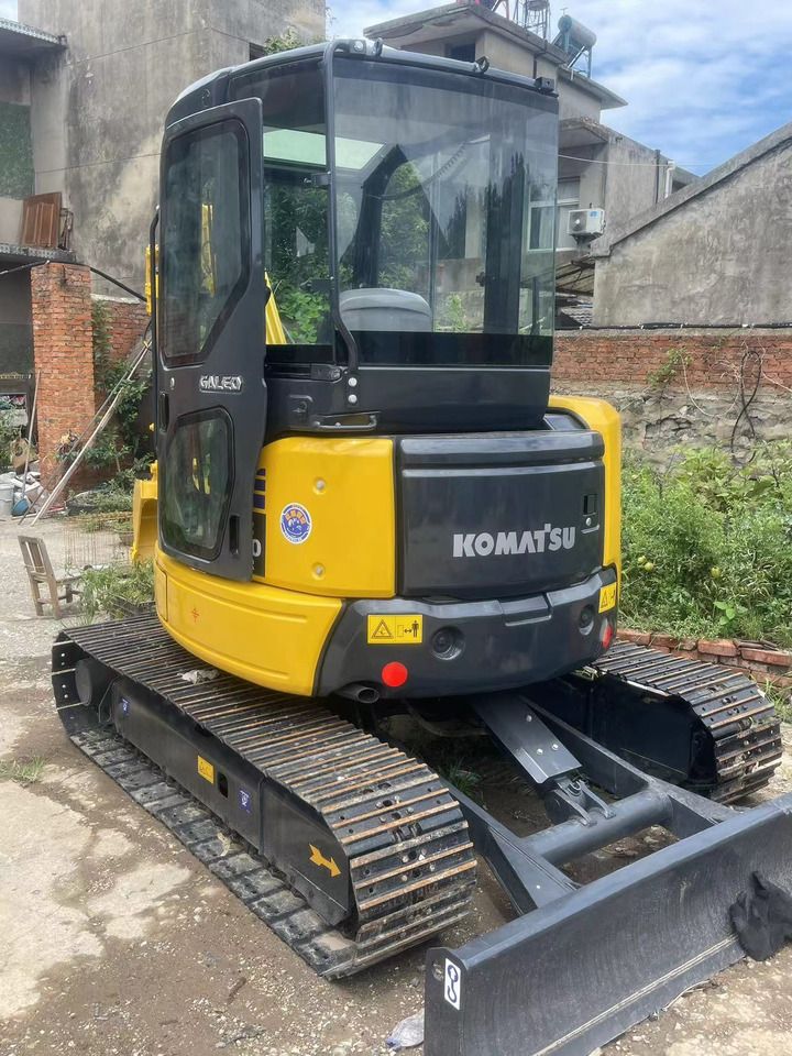 2024 Komatsu PC40MR-2 mini excavator, rear three-quarter view