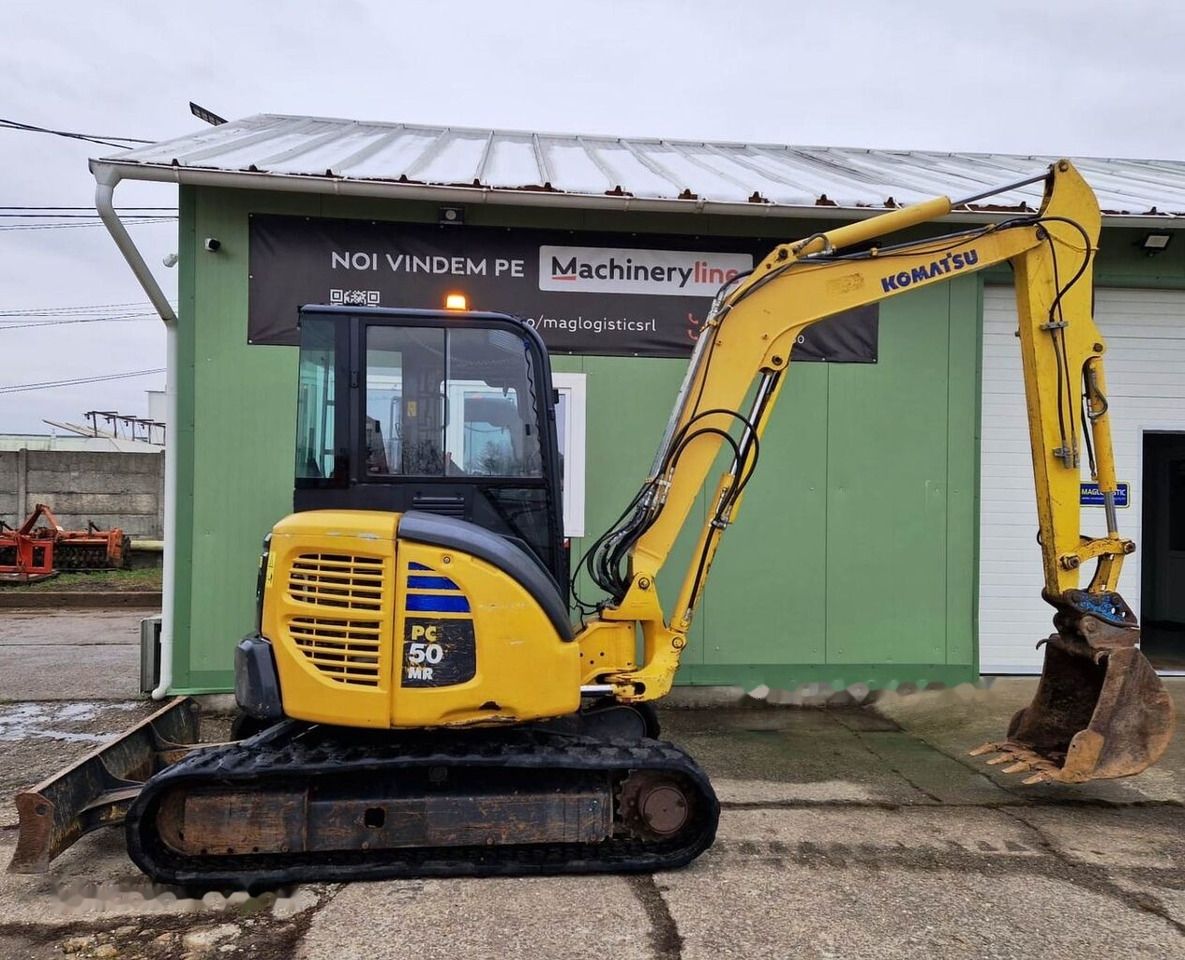 2016 Komatsu PC50MR-2 mini excavator, side view 2016 Komatsu PC50MR-2 mini excavator, side view