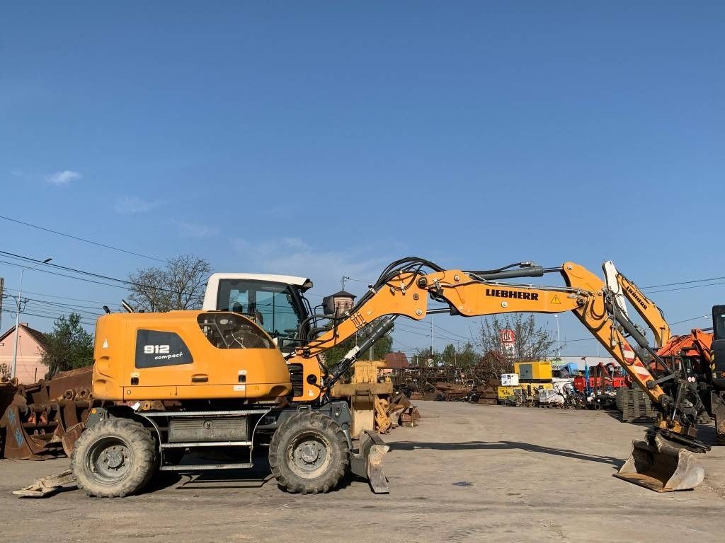 2015 Liebherr A912 Compact wheel excavator side view 2015 Liebherr A912 Compact wheel excavator side view