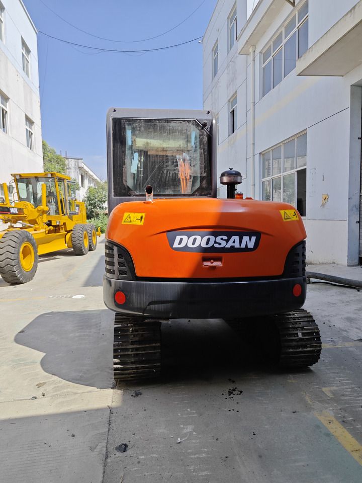 Doosan DH60 mini excavator, rear view Doosan DH60 mini excavator, rear view