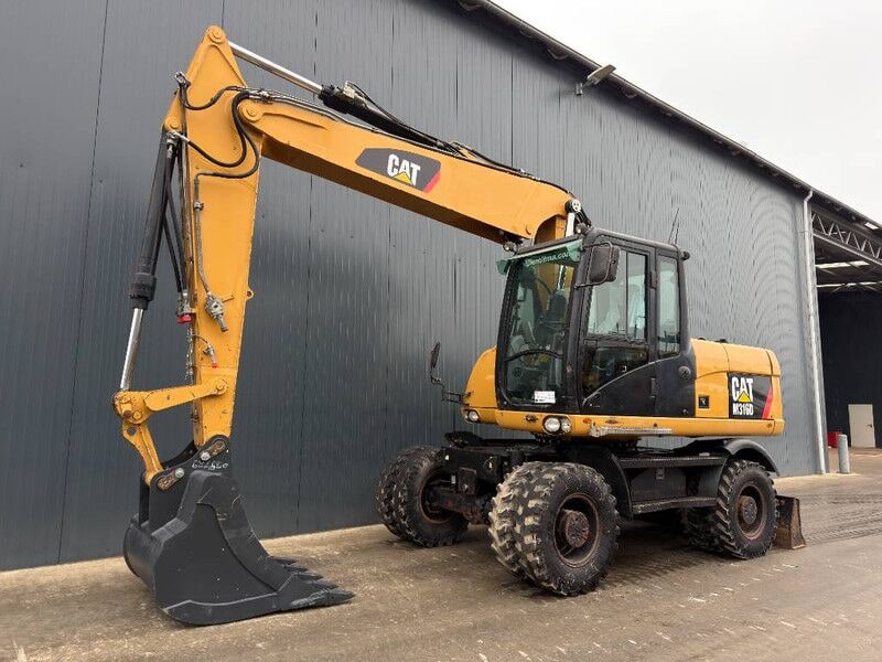 2011 Caterpillar M316D wheel excavator, side profile view