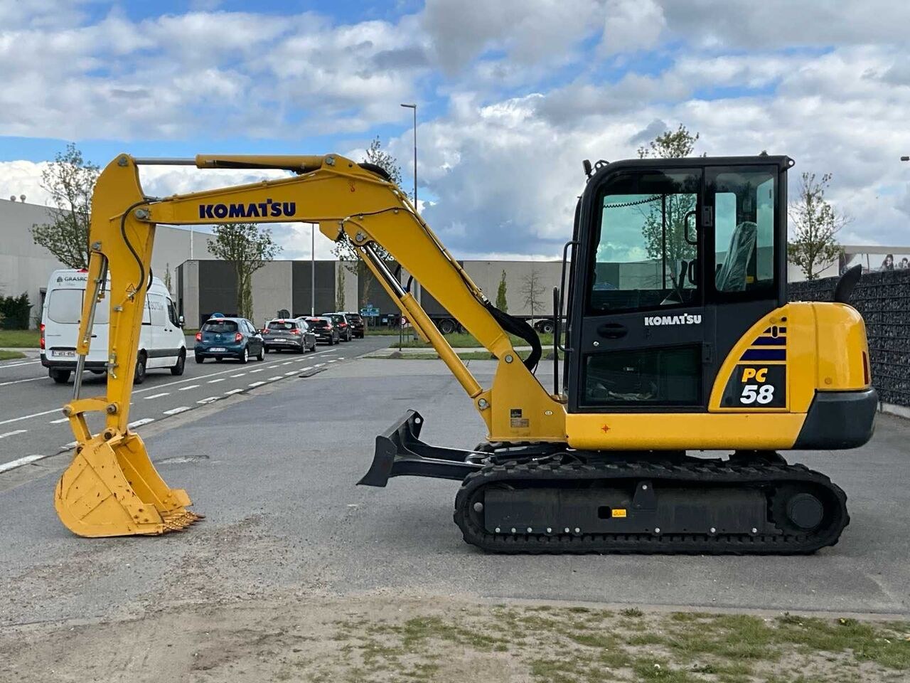 2022 Komatsu PC58-8 crawler excavator, side view 2022 Komatsu PC58-8 crawler excavator, side view
