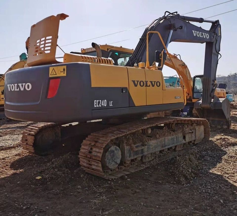 Volvo EC240LC crawler excavator, rear three-quarter view Volvo EC240LC crawler excavator, rear three-quarter view