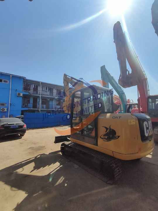 2020 Caterpillar 306E2 crawler excavator, rear three-quarter view 2020 Caterpillar 306E2 crawler excavator, rear three-quarter view