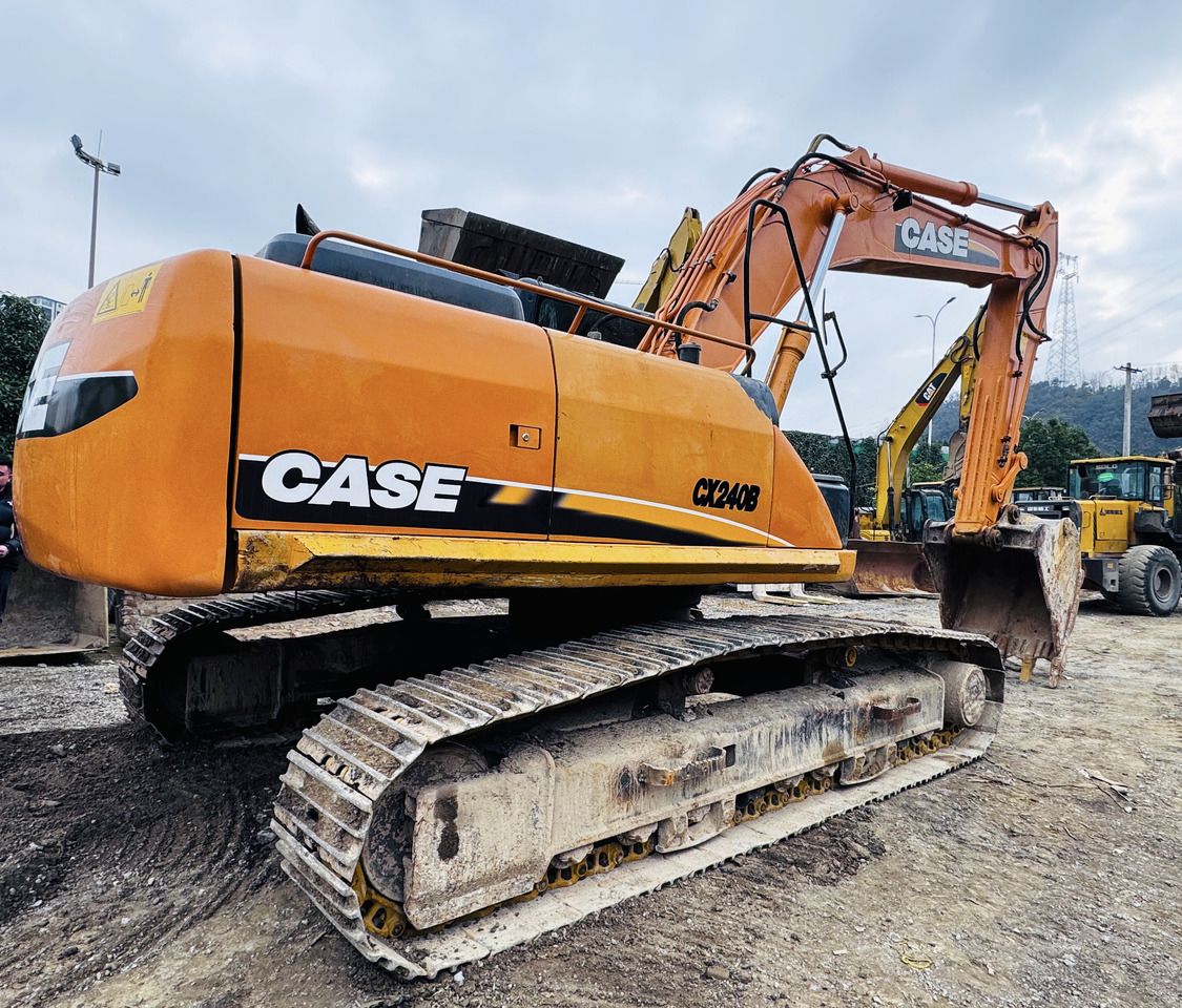 Case CX240B crawler excavator, side view Case CX240B crawler excavator, side view