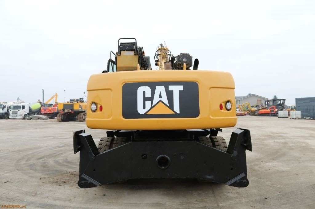2008 Caterpillar M322D material handler, rear view 2008 Caterpillar M322D material handler, rear view