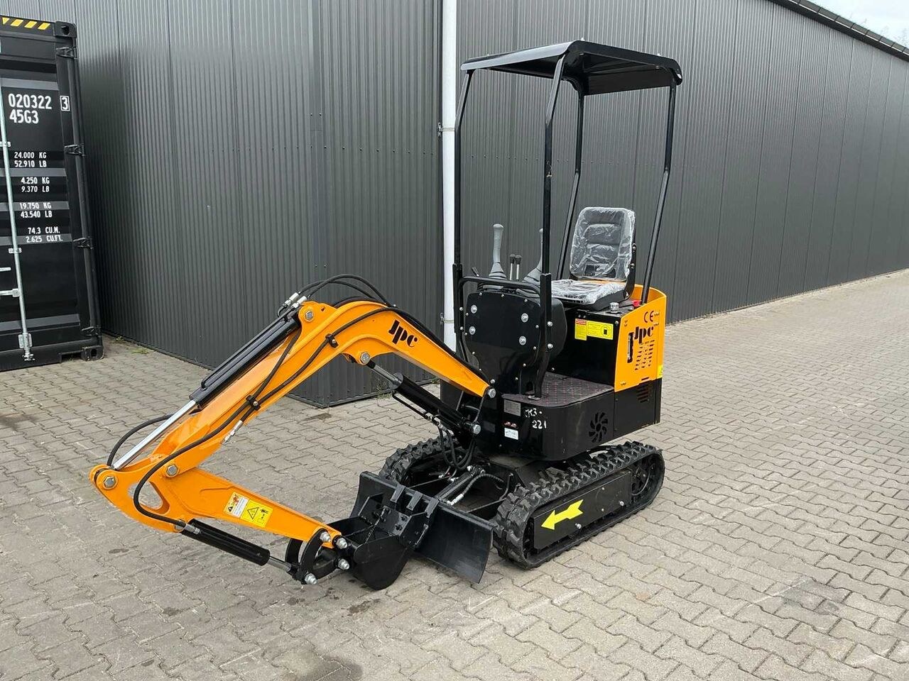 JPC HT-12 mini excavator, three-quarter front view JPC HT-12 mini excavator, three-quarter front view
