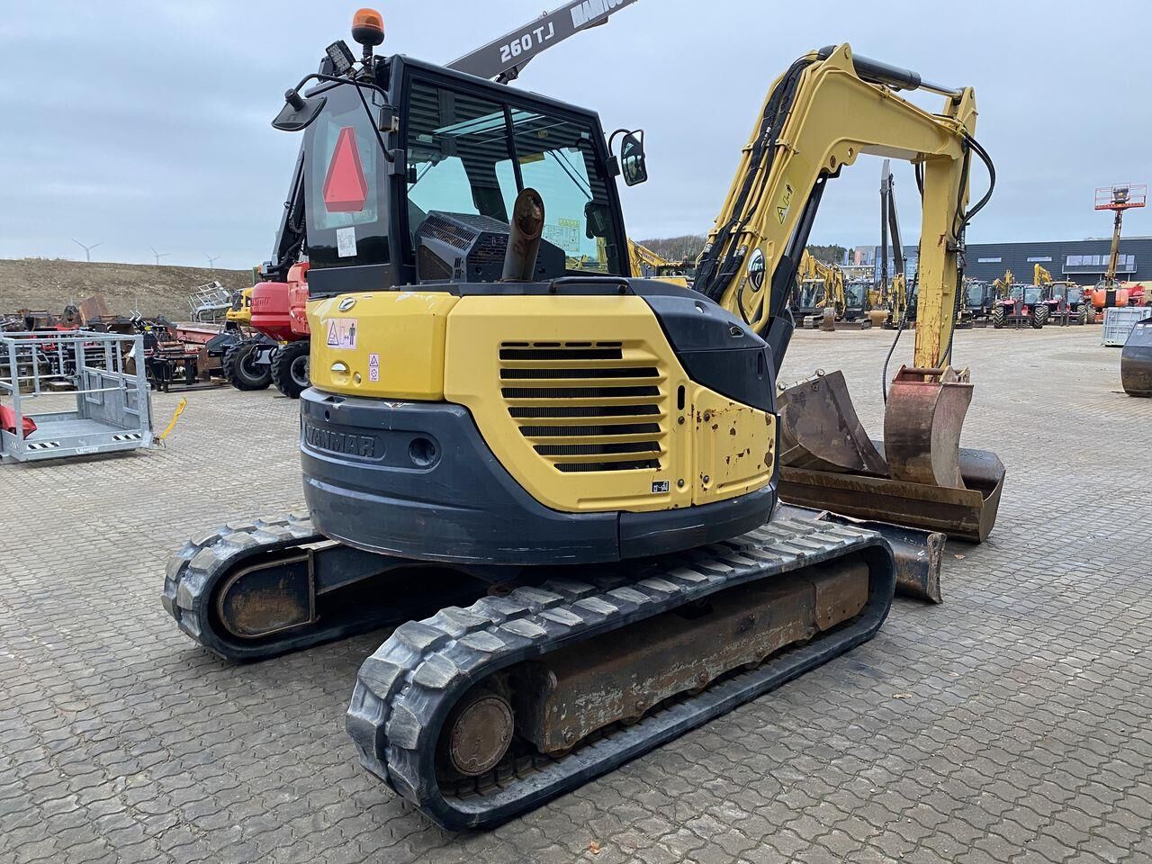 2016 Yanmar VIO80-1A mini excavator, rear three-quarter view 2016 Yanmar VIO80-1A mini excavator, rear three-quarter view