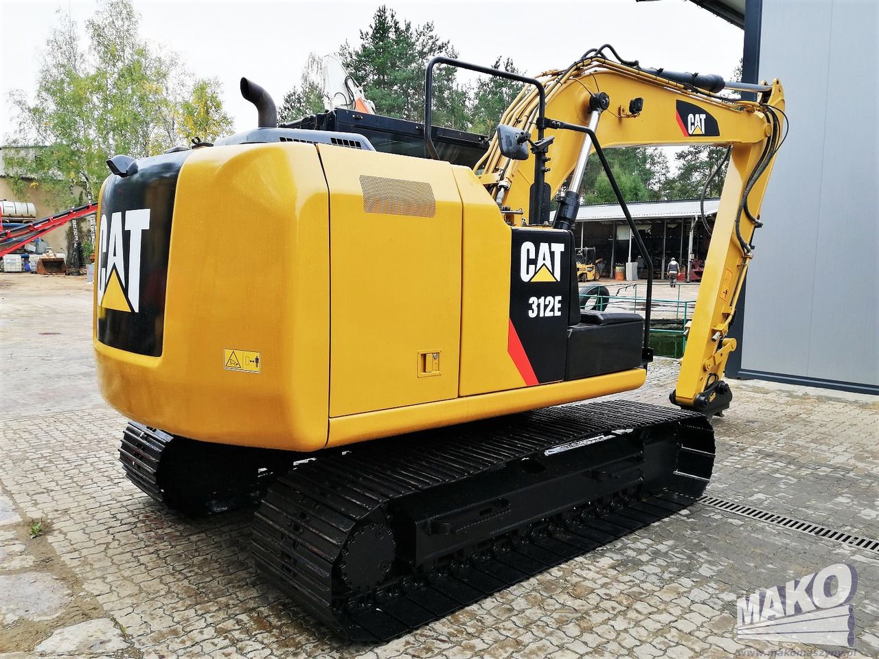 2015 Caterpillar 312E crawler excavator, rear three-quarter view 2015 Caterpillar 312E crawler excavator, rear three-quarter view