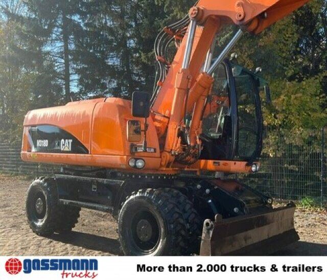 2011 Caterpillar M318D wheel excavator, side profile view 2011 Caterpillar M318D wheel excavator, side profile view
