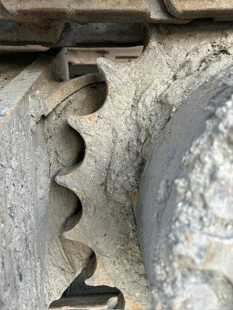 2012 Caterpillar 324E crawler excavator track drive sprocket detail 2012 Caterpillar 324E crawler excavator track drive sprocket detail