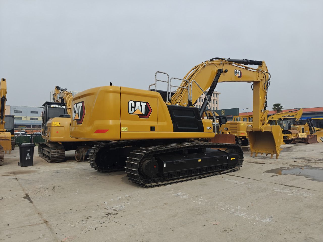 2024 Caterpillar 345GC crawler excavator, rear three-quarter view