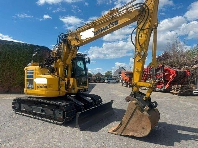 2016 Komatsu PC138US-11 crawler excavator, side view 2016 Komatsu PC138US-11 crawler excavator, side view
