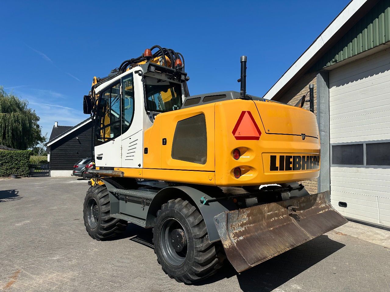 2014 Liebherr A916 wheel excavator, rear three-quarter view 2014 Liebherr A916 wheel excavator, rear three-quarter view