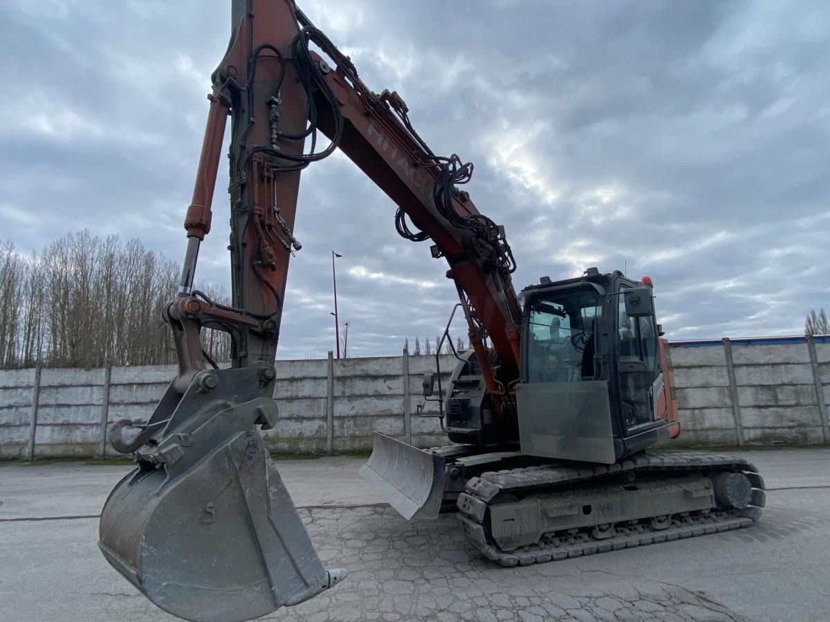 2022 Hitachi ZX135US-7 crawler excavator, front three-quarter view