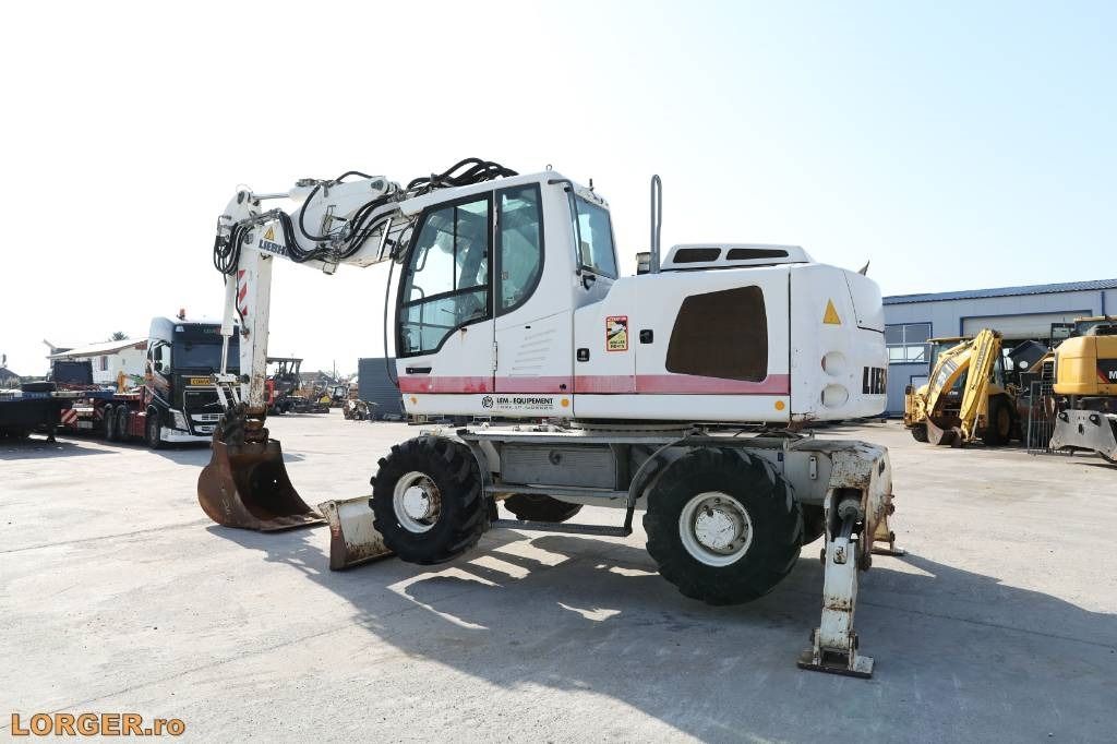 2012 Liebherr A914 wheel excavator side view 2012 Liebherr A914 wheel excavator side view