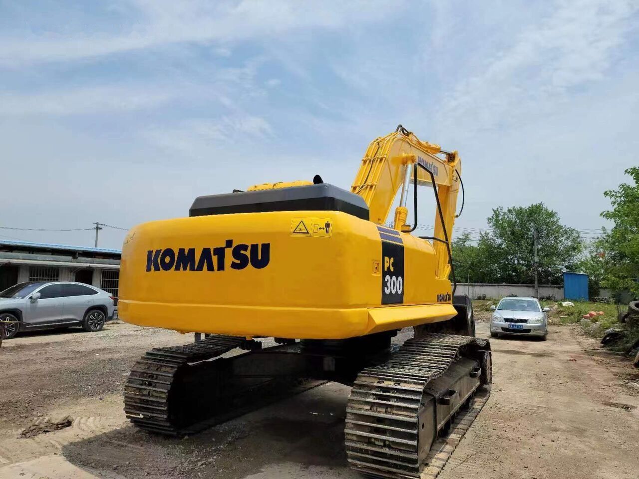 2018 Komatsu PC300-7 crawler excavator, rear three-quarter view 2018 Komatsu PC300-7 crawler excavator, rear three-quarter view