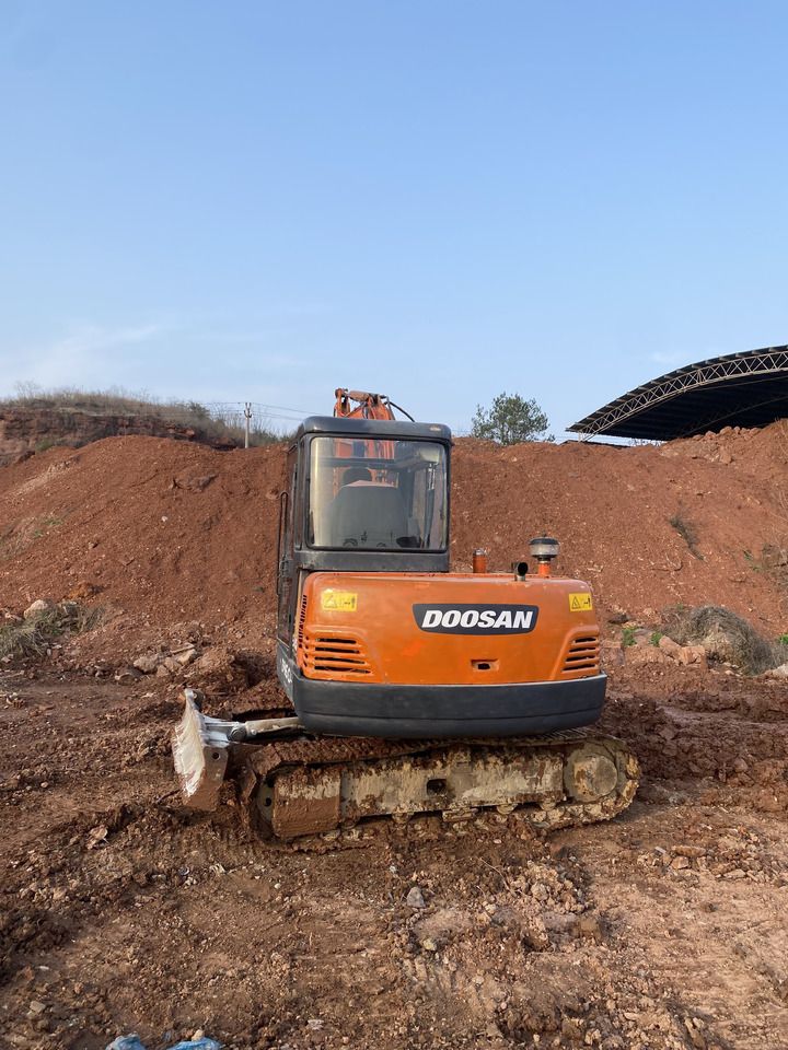 2021 Doosan DH55-V mini excavator, rear view 2021 Doosan DH55-V mini excavator, rear view
