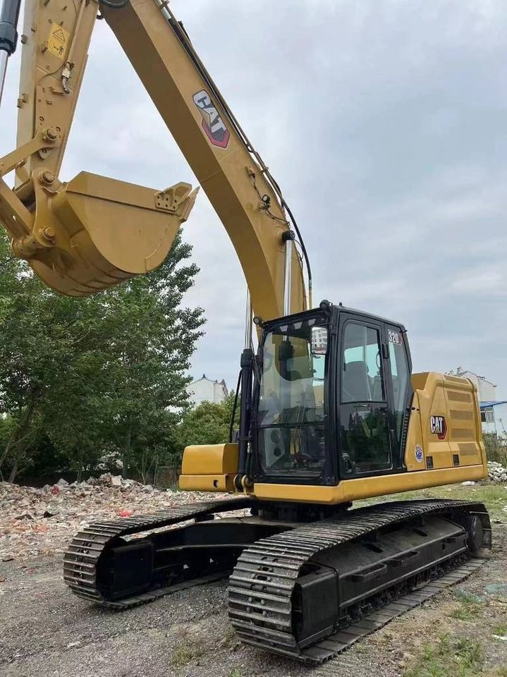 2024 Caterpillar 320GC crawler excavator, front three-quarter view 2024 Caterpillar 320GC crawler excavator, front three-quarter view