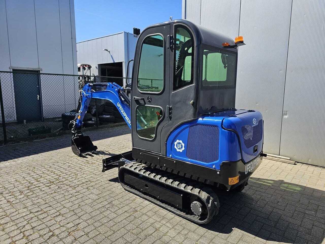 2025 Kubota NM25 mini excavator, rear three-quarter view