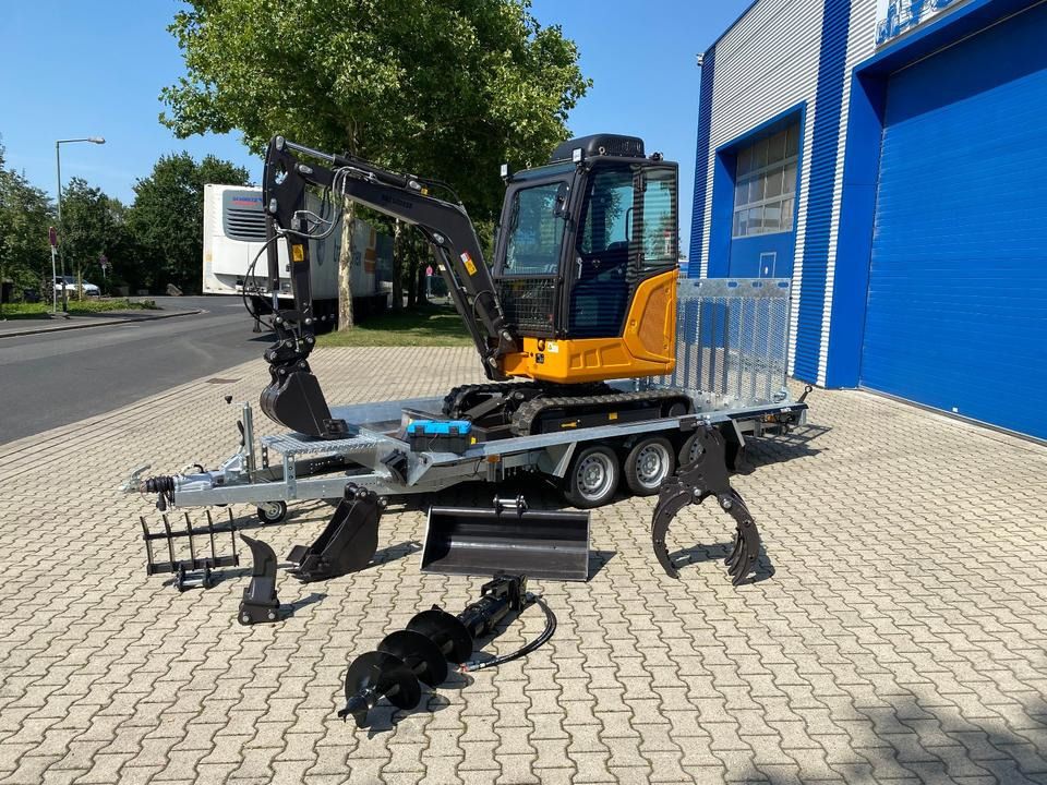 Berger Kraus BK2800ASR mini excavator on trailer with attachments