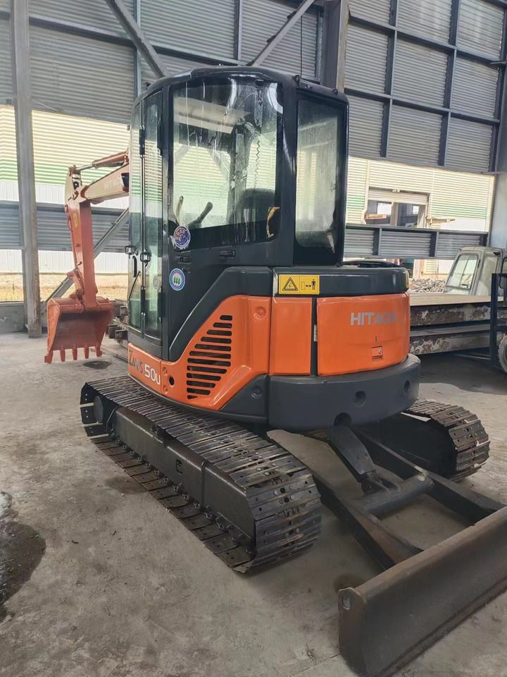 2020 Hitachi ZX50U mini excavator, rear three-quarter view 2020 Hitachi ZX50U mini excavator, rear three-quarter view