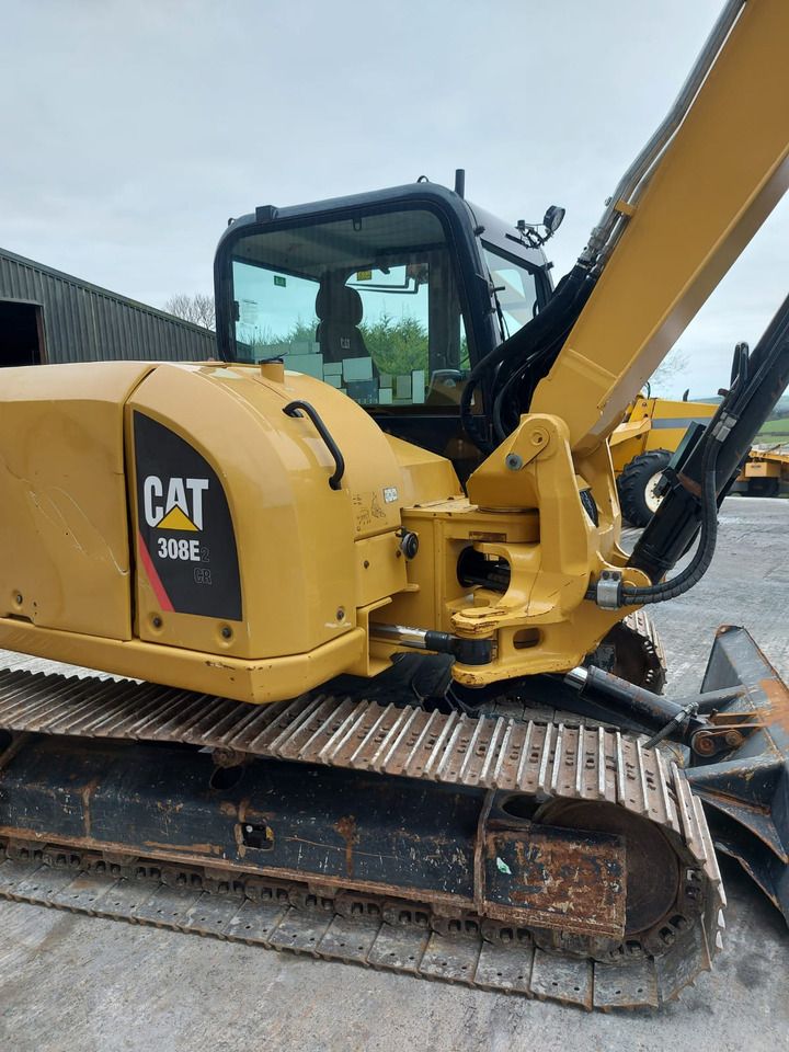 2015 Caterpillar 308E2 CR crawler excavator, side view 2015 Caterpillar 308E2 CR crawler excavator, side view
