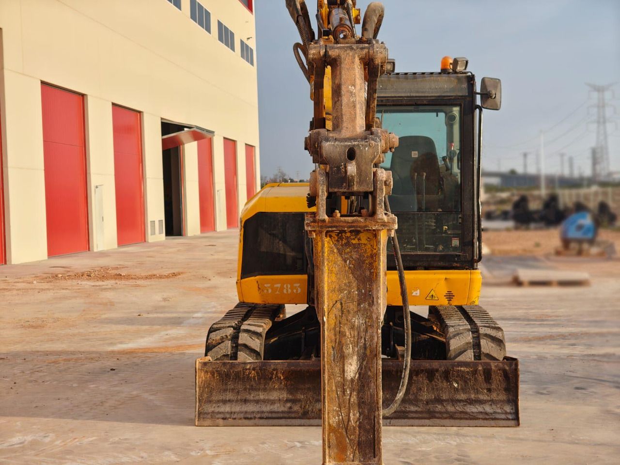 2019 JCB 85Z mini excavator, front view with hydraulic breaker attachment