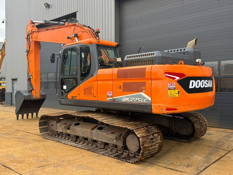 2022 Doosan DX225LC-7 crawler excavator, rear three-quarter view 2022 Doosan DX225LC-7 crawler excavator, rear three-quarter view