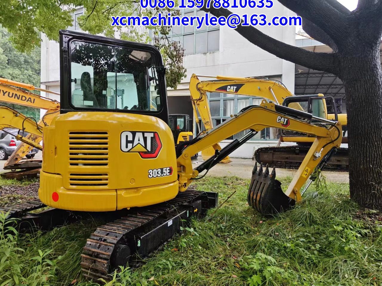 2023 Caterpillar 303.5E mini excavator, rear three-quarter view 2023 Caterpillar 303.5E mini excavator, rear three-quarter view