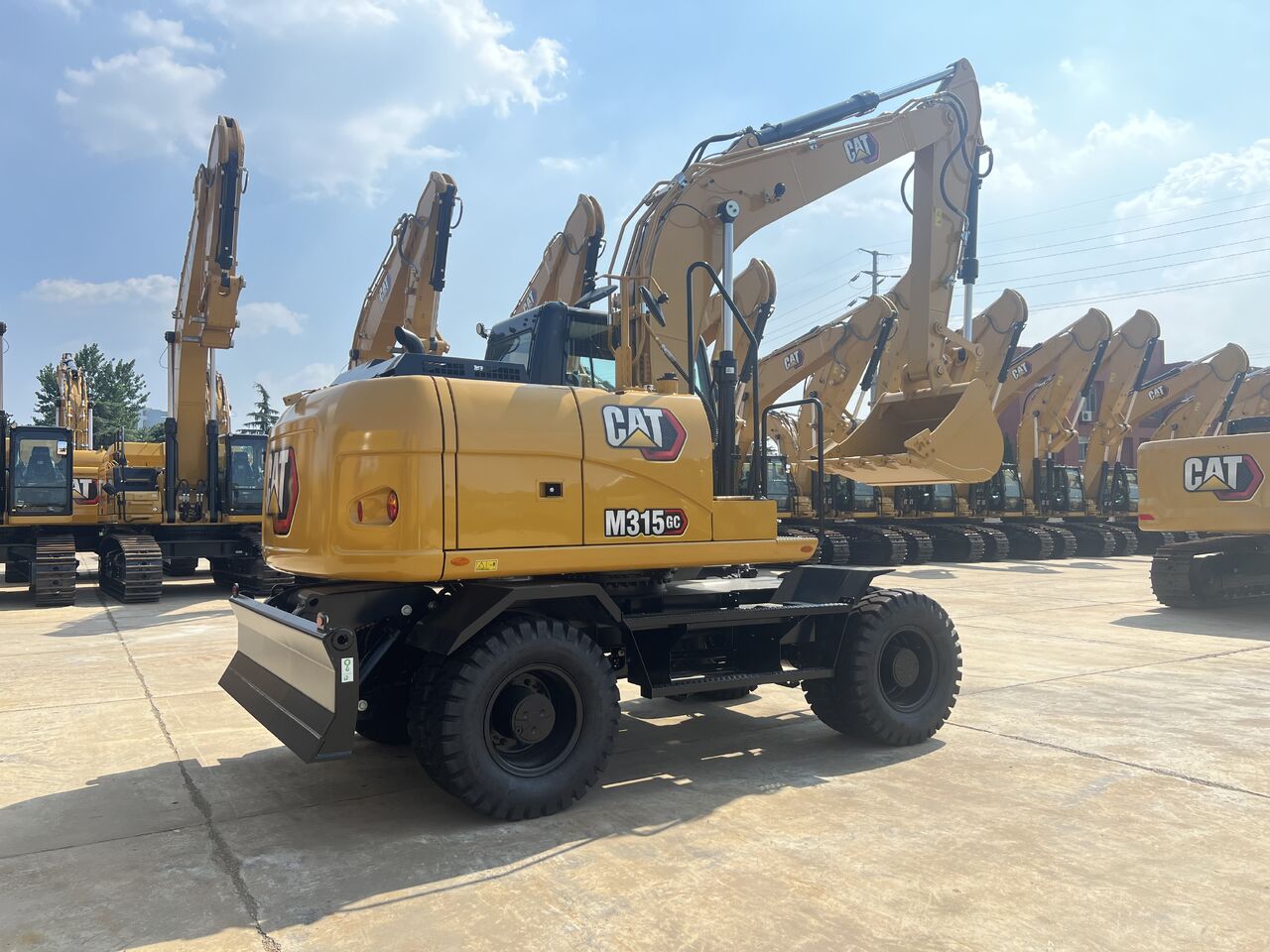 2026 Caterpillar M315GC wheel excavator, rear three-quarter view 2026 Caterpillar M315GC wheel excavator, rear three-quarter view