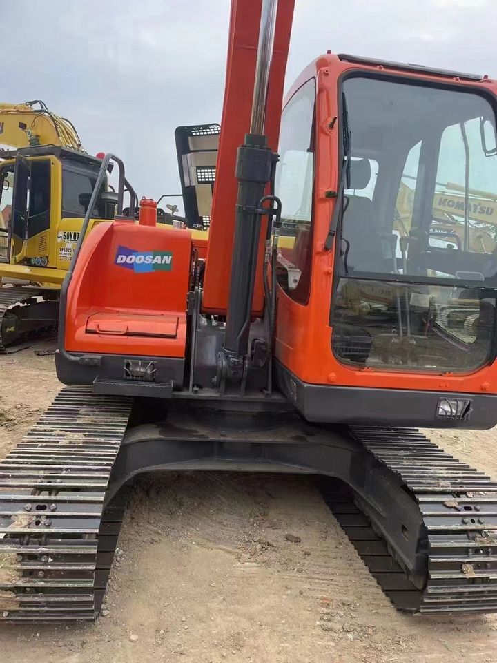 2023 Doosan DX80 mini excavator, rear three-quarter view 2023 Doosan DX80 mini excavator, rear three-quarter view