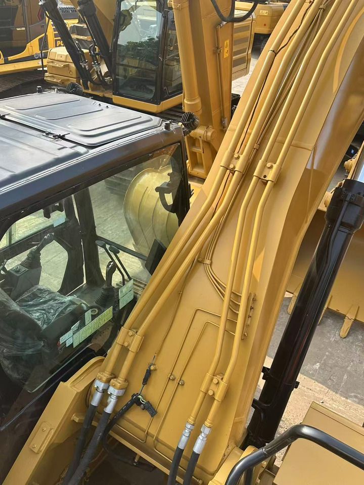 2022 Caterpillar 330GC crawler excavator, high-angle cab and boom view