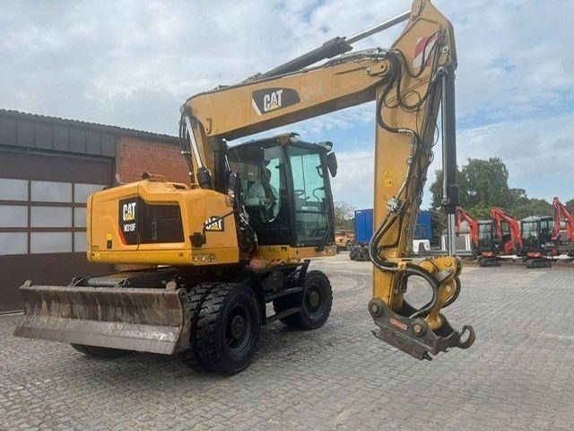 2017 Caterpillar M318F wheel excavator, rear three-quarter view