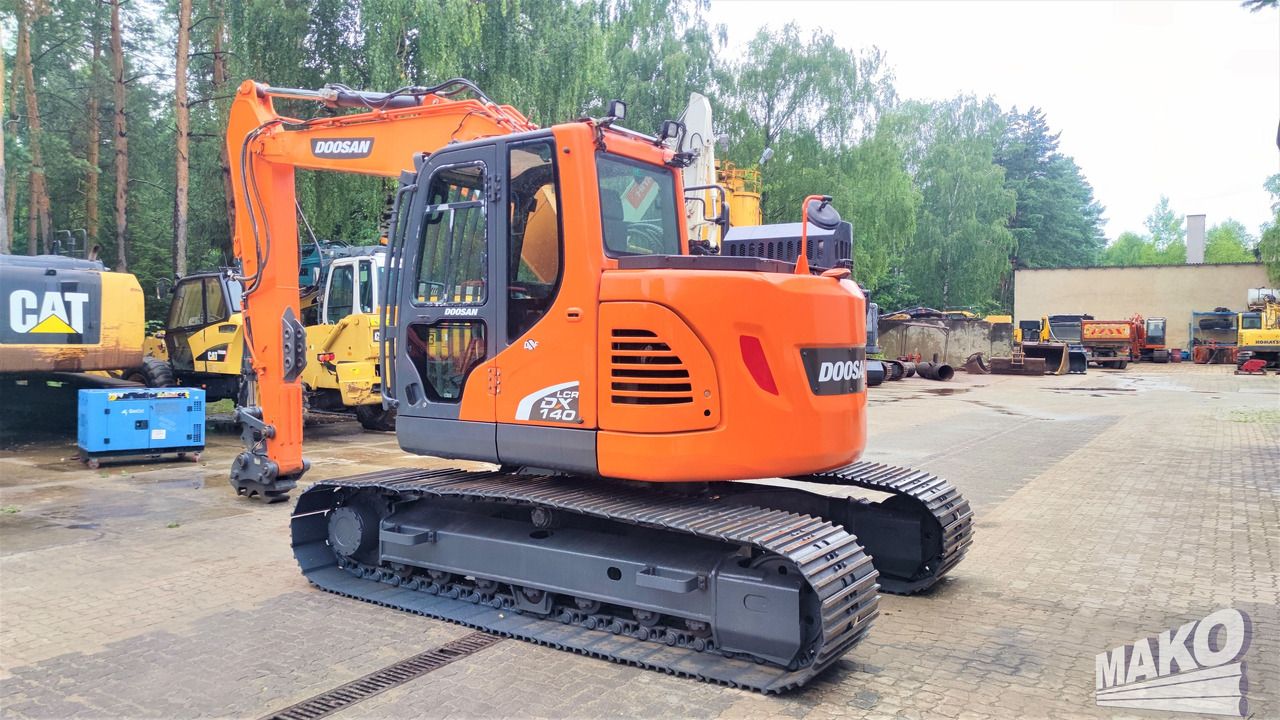 2018 Doosan DX140LCR-5 crawler excavator, rear three-quarter view 2018 Doosan DX140LCR-5 crawler excavator, rear three-quarter view
