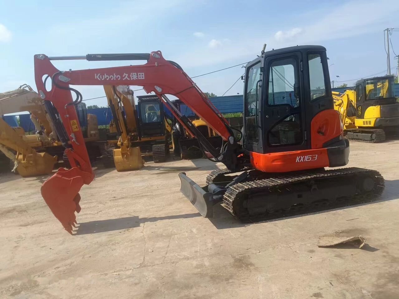 2022 Kubota KX163 mini excavator, side view 2022 Kubota KX163 mini excavator, side view