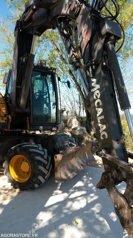 2006 Mecalac 714 MW wheel excavator, side view 2006 Mecalac 714 MW wheel excavator, side view