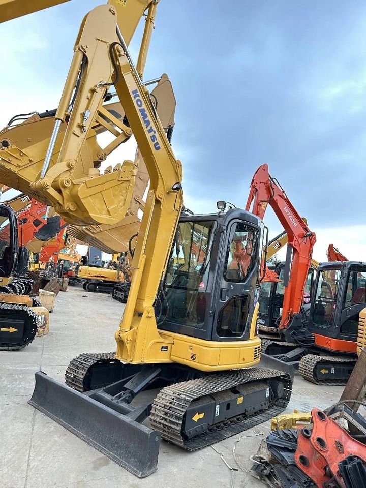 2024 Komatsu PC-55MR mini excavator, front three-quarter view 2024 Komatsu PC-55MR mini excavator, front three-quarter view