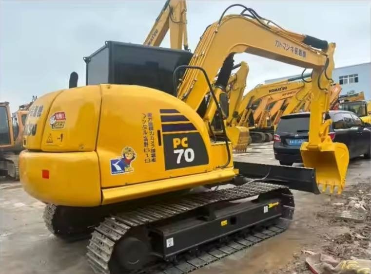 2024 Komatsu PC70-8 mini excavator, rear three-quarter view 2024 Komatsu PC70-8 mini excavator, rear three-quarter view