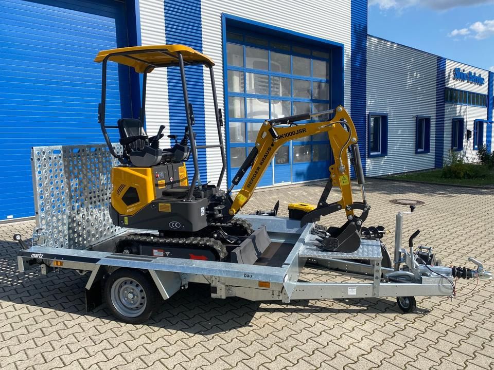 Berger Kraus BK1000JSR mini excavator on a trailer, side view Berger Kraus BK1000JSR mini excavator on a trailer, side view