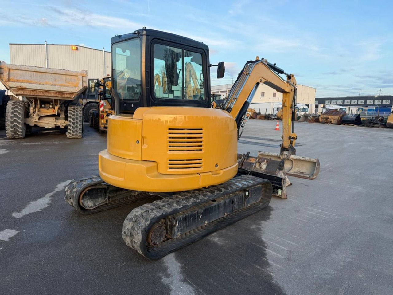 2021 Caterpillar 305E2 crawler excavator, rear three-quarter view