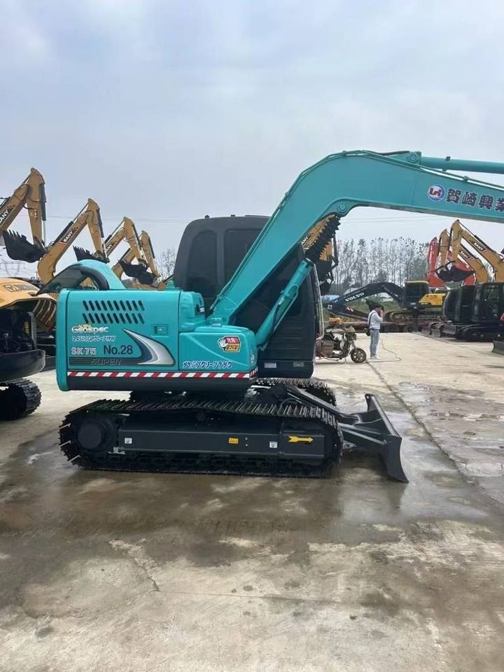 2025 Kobelco SK75 mini excavator, side profile view 2025 Kobelco SK75 mini excavator, side profile view