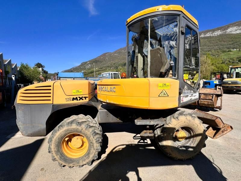 2008 Mecalac 12MXT wheel excavator side view 2008 Mecalac 12MXT wheel excavator side view