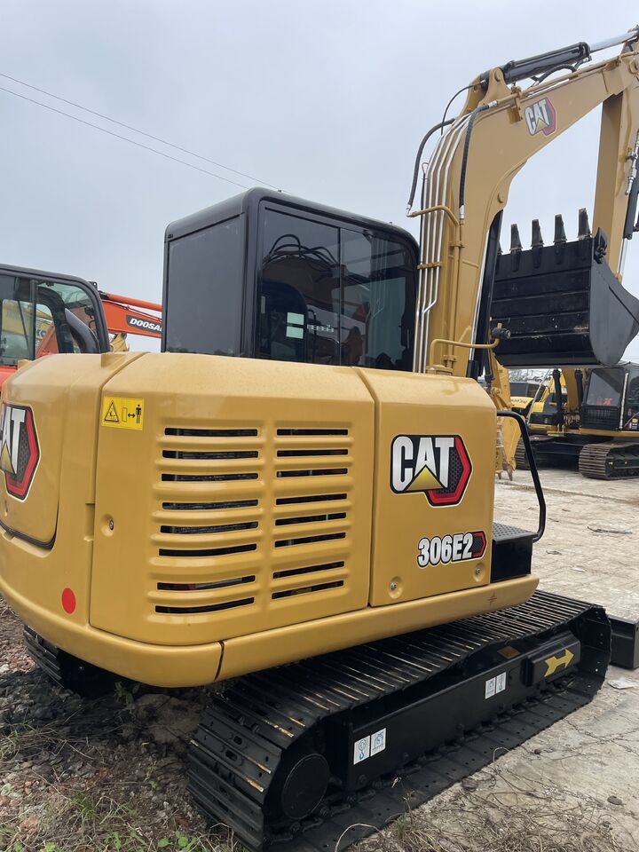 2024 Caterpillar 306E2 excavator, rear three-quarter view