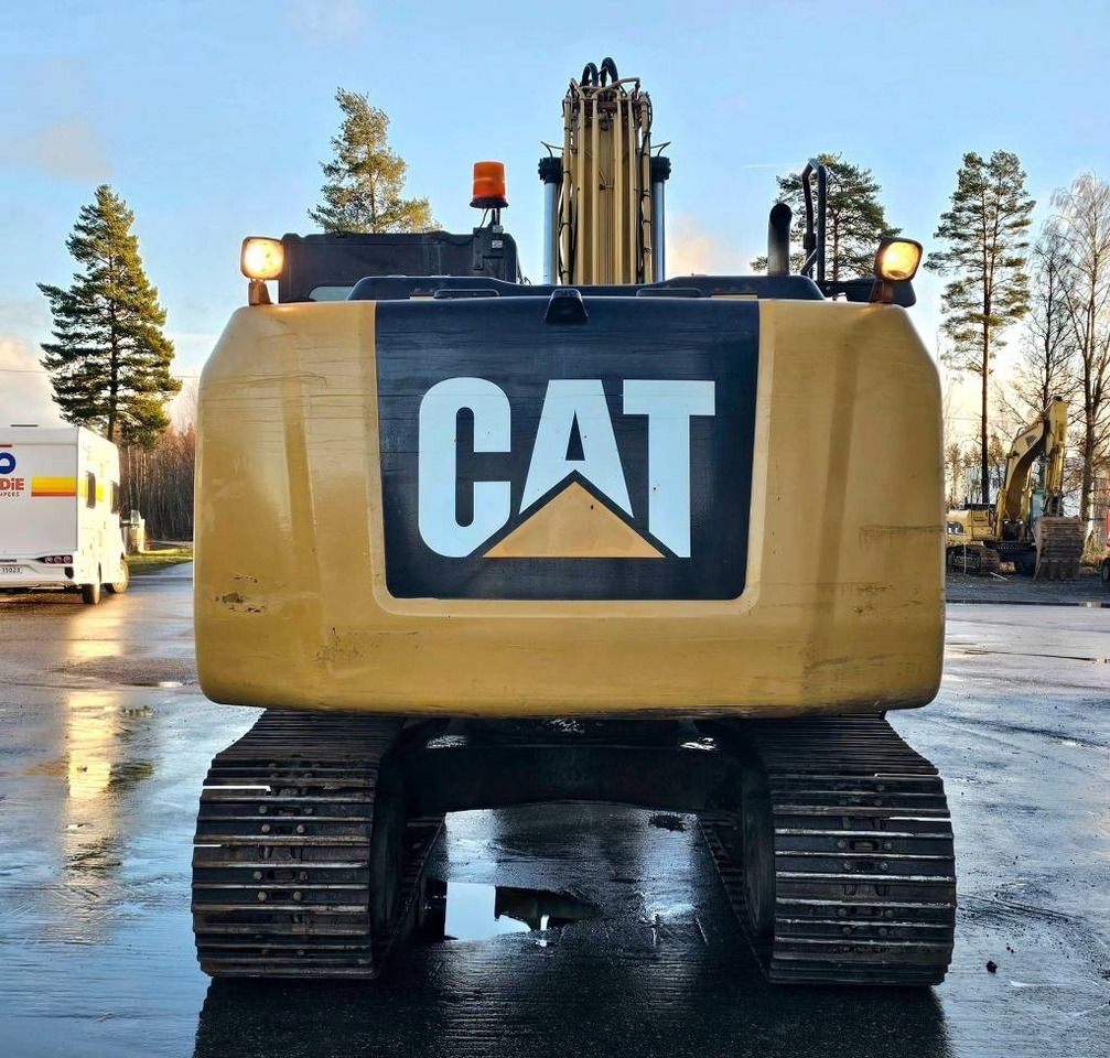2012 Caterpillar 316EL crawler excavator, rear view 2012 Caterpillar 316EL crawler excavator, rear view