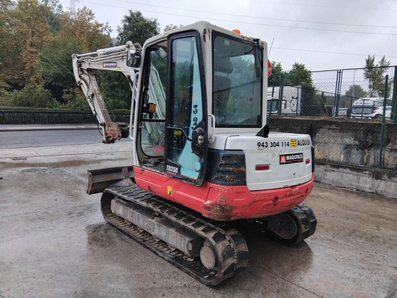 2016 Takeuchi TB250 mini excavator, rear three-quarter view 2016 Takeuchi TB250 mini excavator, rear three-quarter view