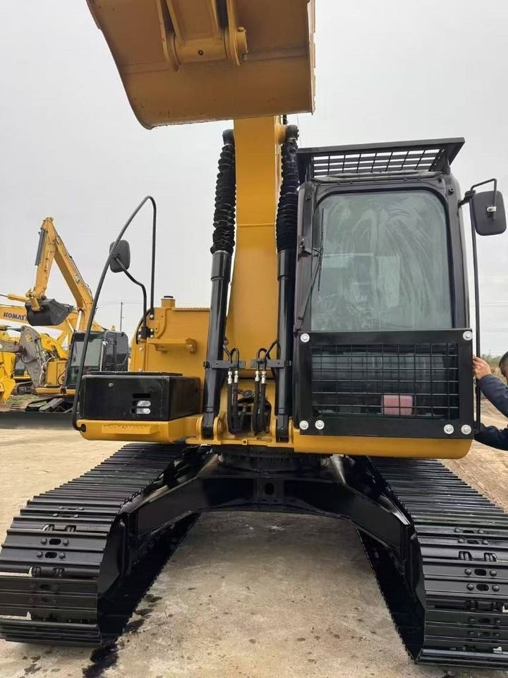 2024 Caterpillar 312 crawler excavator, front view 2024 Caterpillar 312 crawler excavator, front view