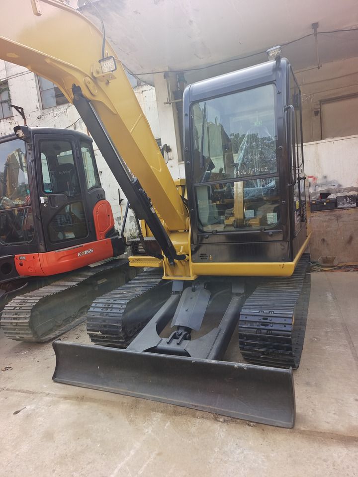 2024 Caterpillar 305.5E2 mini excavator front view 2024 Caterpillar 305.5E2 mini excavator front view