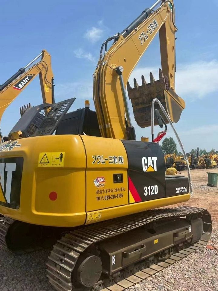 2024 Caterpillar 312D mini excavator, rear three-quarter view 2024 Caterpillar 312D mini excavator, rear three-quarter view
