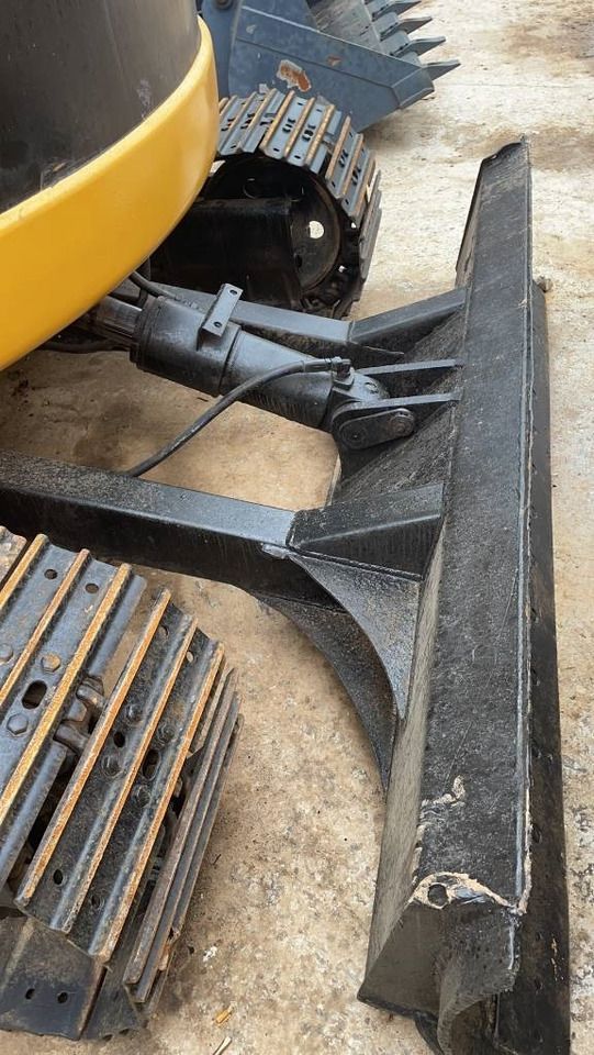 2023 Caterpillar 308C mini excavator front blade and tracks detail 2023 Caterpillar 308C mini excavator front blade and tracks detail